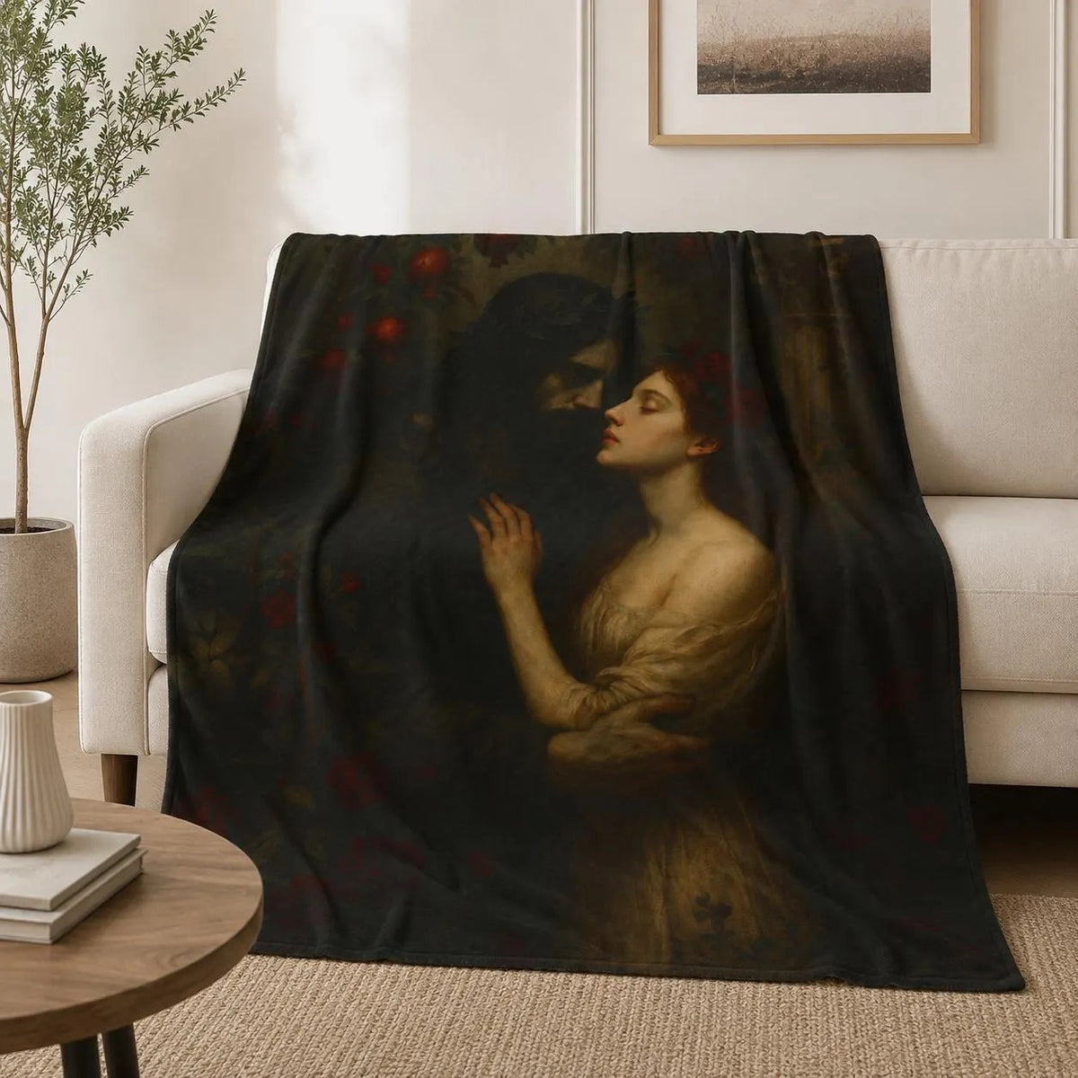 Hades and Persephone plush blanket showing the underworld king embracing his queen among pomegranates, draped over a sofa