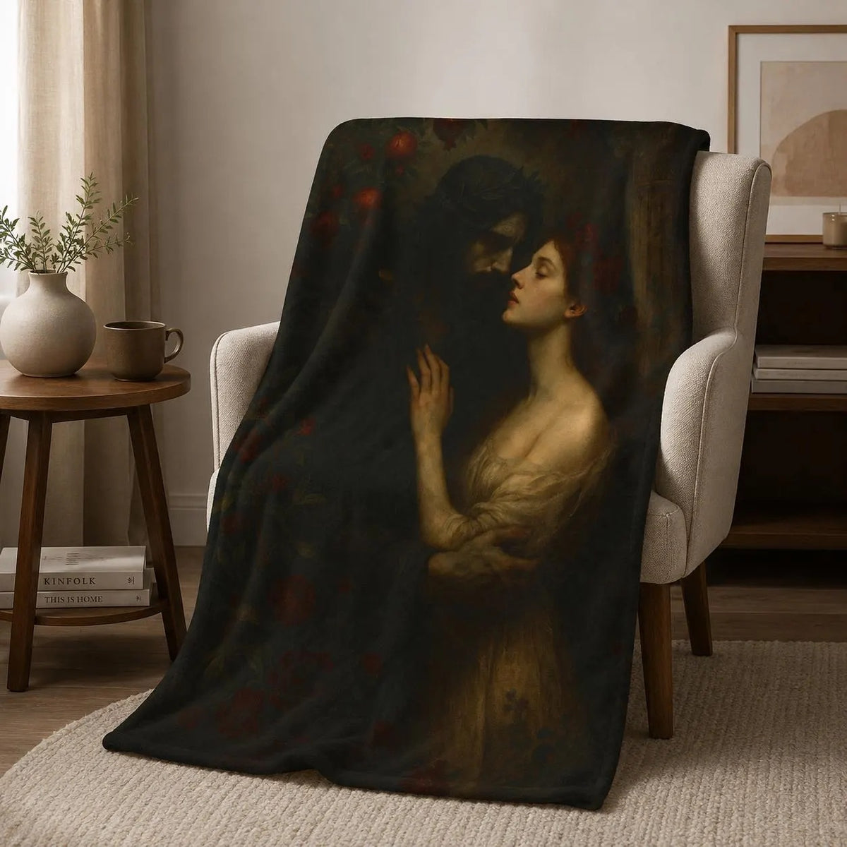 Hades and Persephone plush blanket with the fine-art myth embrace, displayed over an armchair